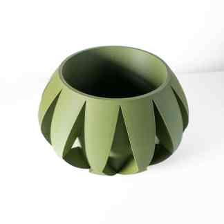 Precision-engineered 3D-printed green mechanical component, showcasing advanced additive manufacturing technology.