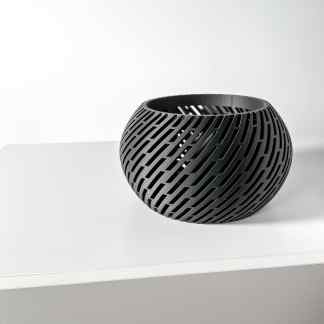 Sleek black 3D printed decorative bowl showcases innovative design and craftsmanship.