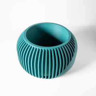 Vibrant blue 3D-printed vase with ribbed texture showcasing modern 3D printing tech.