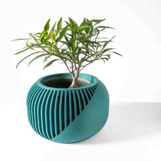 Stylish teal 3D-printed plant pot with unique slit design, perfect for home and office decor.