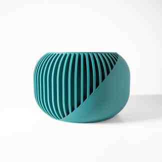Vibrant turquoise 3D-printed decorative vase with intricate cut-out design, modern home decor accessory.