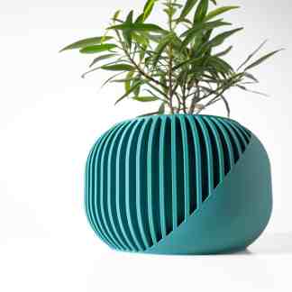 A modern 3D printed planter featuring a sleek, geometric design in teal, perfect for stylish home decor.