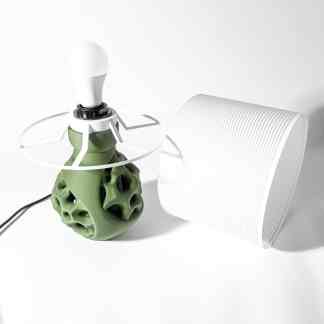 Modern 3D-printed lamp with intricate geometric patterns and sleek white and green aesthetic.