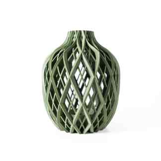 Detailed green 3D-printed vase with intricate lattice design, showcasing innovative additive manufacturing technology.