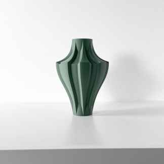 Green modern decorative vase for home décor and interior design.