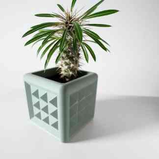 3D printed plant pot with geometric pattern for stylish home decor.