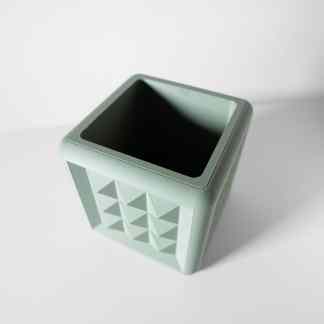 Custom 3D printed geometric teal planter pot for modern home decor and plant lovers.