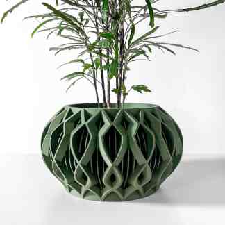 Stylish 3D-printed plant pot with complex lattice pattern, perfect for modern decor.