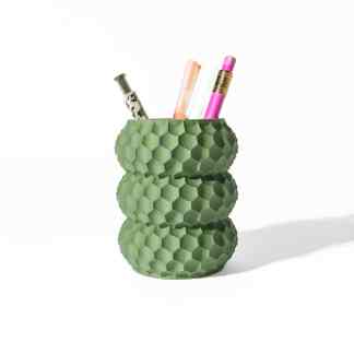Colorful 3D printed pen holder with hexagon design for desk organization and modern decor.