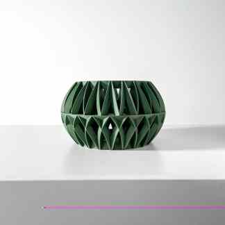 Green 3D printed decorative vase with unique geometric structure for stylish home decor.