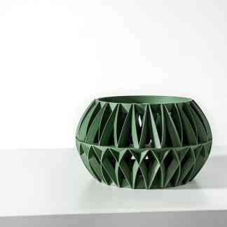 Detailed 3D printed geometric green vase showcasing intricate design and craftsmanship.