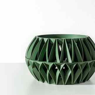3D printed green geometric vase, modern design, perfect for home decor or artistic displays.
