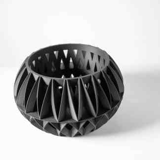 Highly detailed black 3D printed geometric pattern ring. Perfect for artistic and design projects.