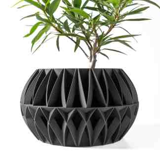 3D-printed plant pot with geometric design, perfect for modern decor and sustainable gardening.