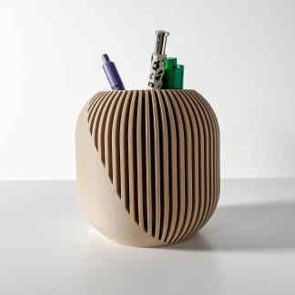 Stylish beige desk holder with vertical slats, perfect for organizing pens and stationery in a modern workspace.