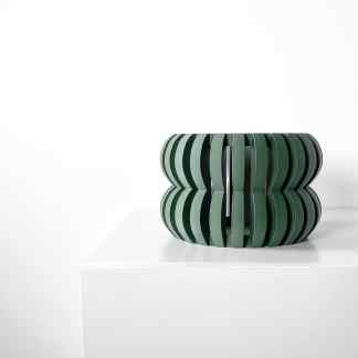 Stylish green 3D printed furniture with intricate layered design, ideal for modern interiors.