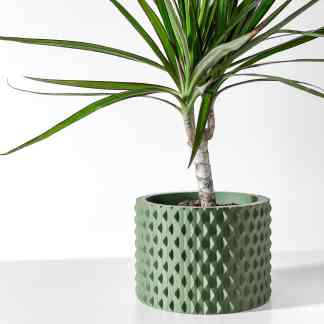 Vibrant green ONDIR planter with textured surface, ideal for stylish home decor.