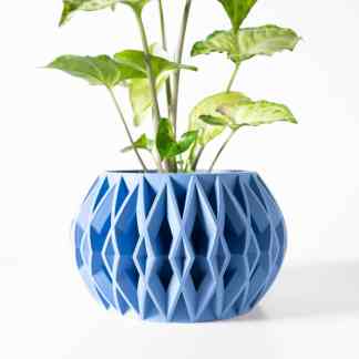 3D printed plant pot with geometric pattern, perfect for home decor and gardening.