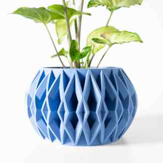 3D printed blue vase with intricate geometric lattice, perfect for modern interior decorating.