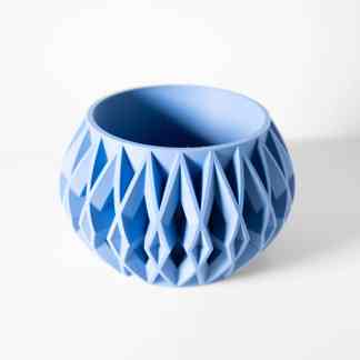 3D printed blue geometric vase for home decor, showcasing innovative design and craftsmanship.