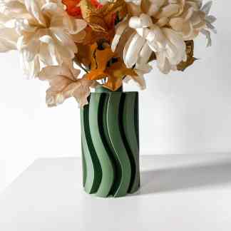 3D printed modern flower vase with wavy green pattern for stylish home decor.