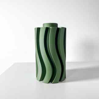 Sleek green 3D-printed vase with artistic curves, highlighting advanced 3D printing technology by AM Square 3D.