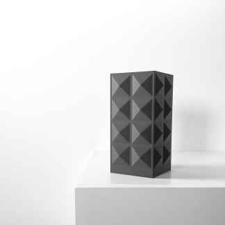 Stylish black ORME vase with a geometric pattern, perfect for modern interior decoration.