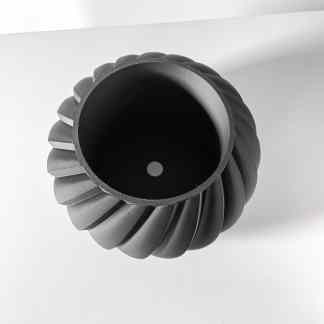 High-quality black 3D-printed turbine part with precise engineering.