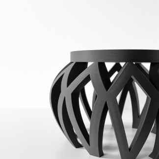 High-quality 3D printed modern black geometric furniture sculpture with artistic craftsmanship.