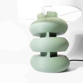 A sleek, contemporary green lamp with smooth geometric shapes, ideal for modern interiors.