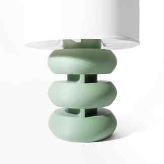 High-quality 3D rendered image of a sleek green and white modern table lamp for stylish home lighting.