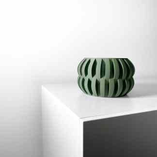 Stylish 3D-printed vase showcasing intricate design and craftsmanship.