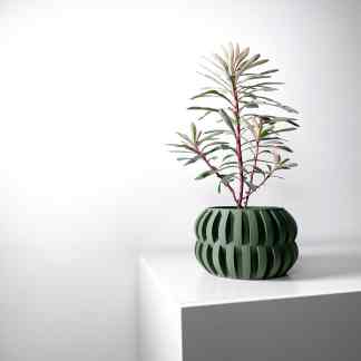 Bright green decorative plant pot 3D printed for stylish interior decor and modern aesthetics.