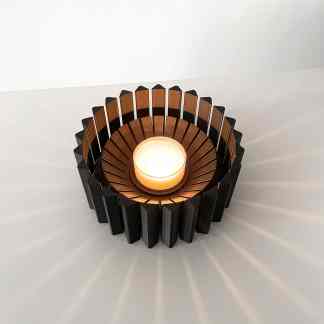 Elegant modern candle holder with LED candle, stylish home decor, ideal for creating cozy ambiance, featuring unique geometric design.