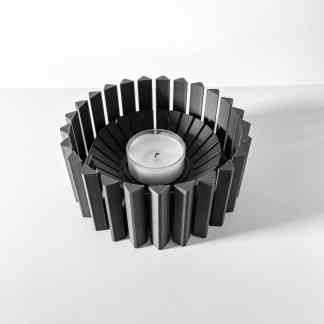 Black geometric candle holder with modern design, perfect for home decor and ambiance.