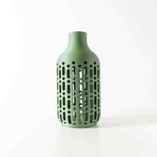 3D printed geometric green vase for stylish home decor and interior design.