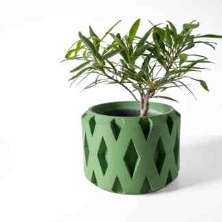 3D-printed green plant pot with a hexagonal geometric pattern, ideal for stylish plant display and eco-conscious homes.