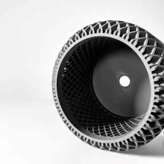 Black 3D printed airflow vent with intricate lattice design for ventilation and cooling applications.