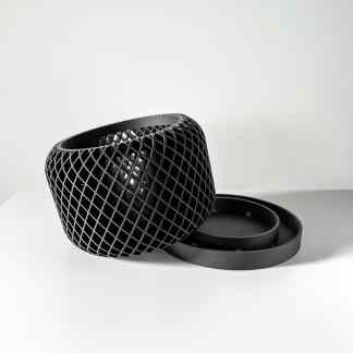 Mesh speaker cover designed for 3D printing, showcasing modern black design and intricate structure.
