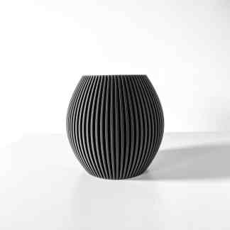 Elegant black striped vase with a sleek, modern design perfect for minimalist interior decor.