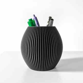 Stylish black ribbed pen holder with colorful pens and markers on a white background.