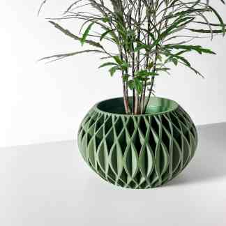 3D printed modern green planter with intricate geometric pattern for stylish indoor garden.