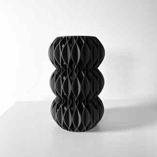 Highly detailed black 3D printed vase with intricate geometric design.