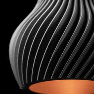Stylish black and orange pendant lamp with unique ribbed design, ideal for modern decor.