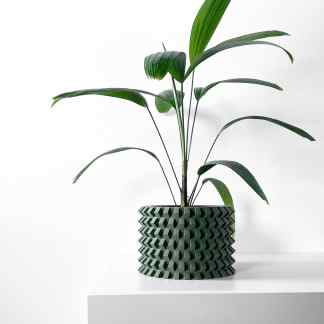 High-quality 3D-printed geometric flowerpot with a green plant, perfect for stylish home decor.