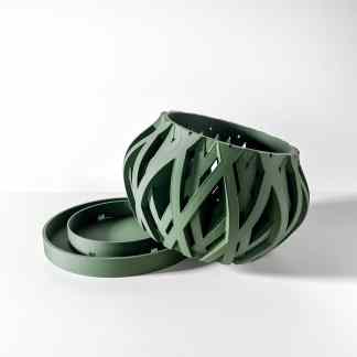 Green 3D-printed vase with intricate, openwork design, perfect for floral decor.
