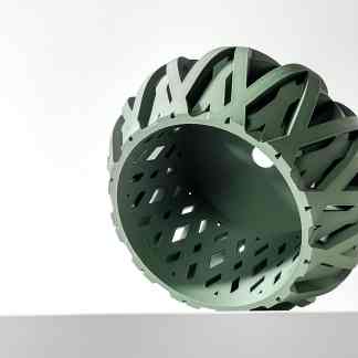 Highly detailed 3D-printed geometric cylindrical object showcasing advanced additive manufacturing techniques.