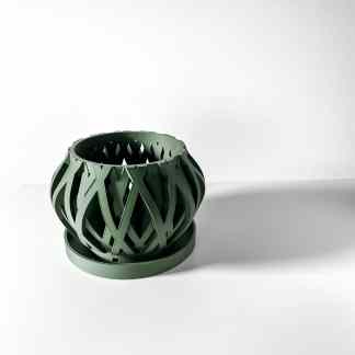 Unique 3D-printed vase showcasing intricate geometric design in green color.