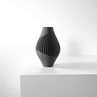 Stylish black RINEX vase with innovative slatted pattern, perfect for modern interiors.