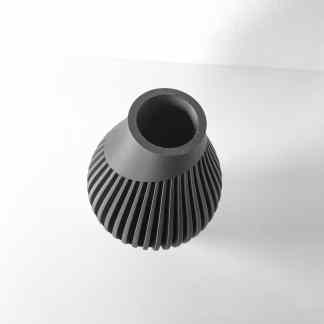 High-quality 3D-printed turbine component with fins, highlighting precise design and engineering.